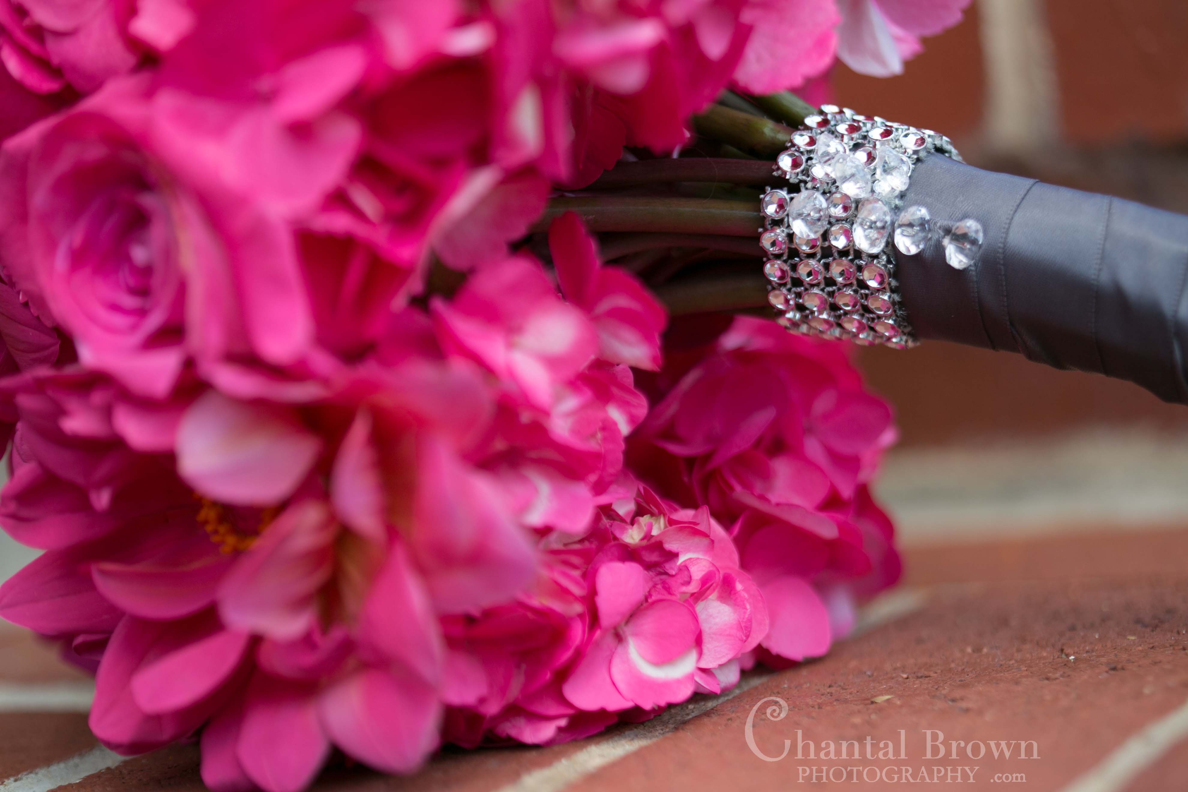 Pink bouquet flowers by Timeless Fiori with diamonds at Royal Lane Church Dallas Wedding Photograpoher